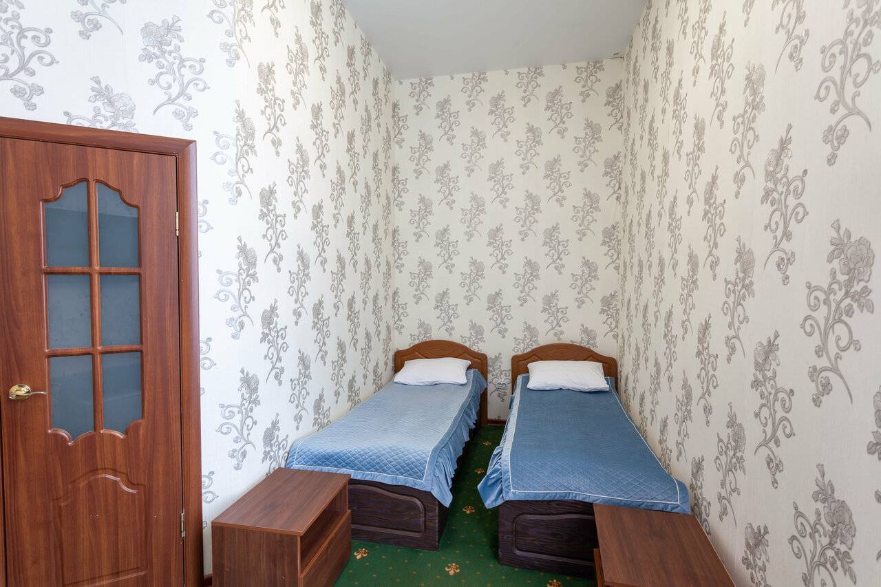 Фотографии номера Бюджетный двухместный номер с 2 отдельными кроватями в Гостинице Космос Комсомольск-на-Амуре