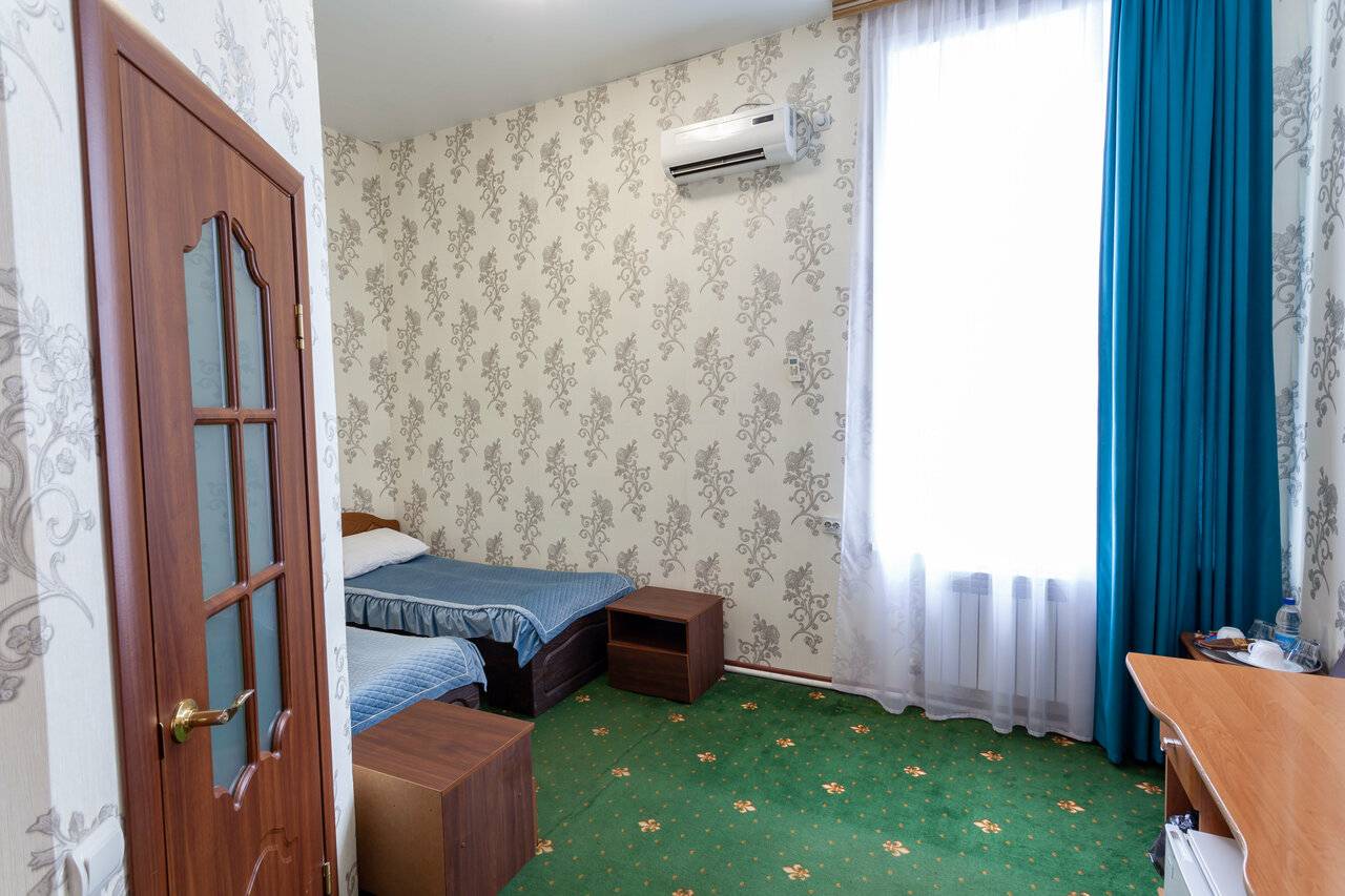 Фотографии номера Бюджетный двухместный номер с 2 отдельными кроватями в Гостинице Космос Комсомольск-на-Амуре